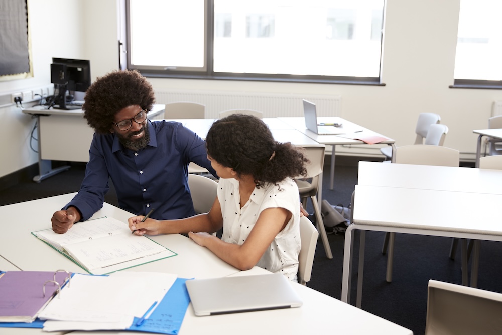 Young adult with tutor Young adult with tutor